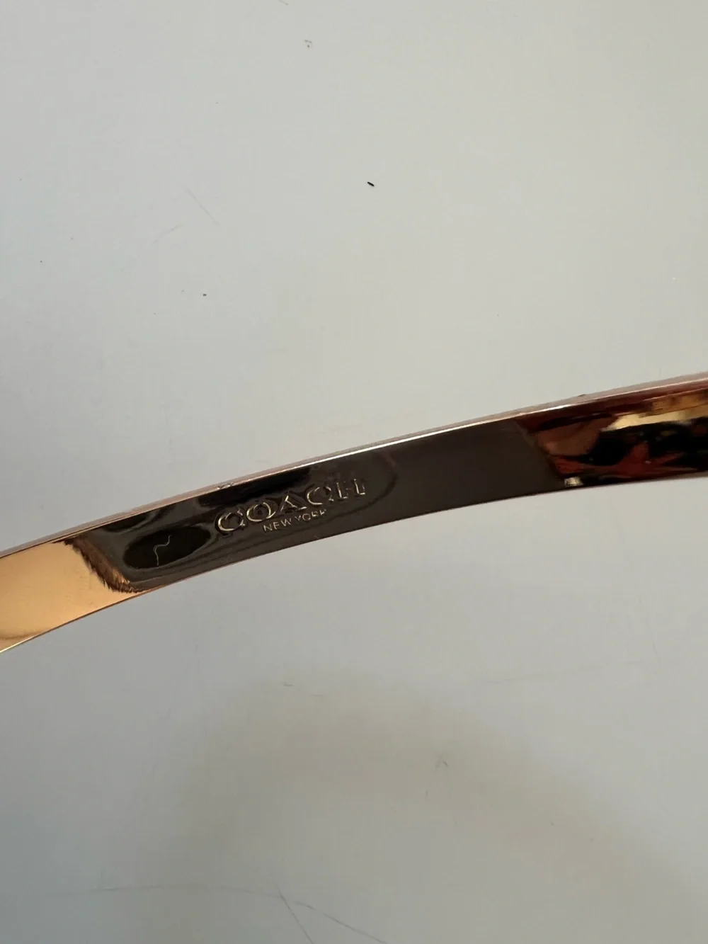 Coach Signature Hinged Bangle Bracelet in Rose Gold CX686